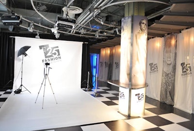 Guests entered the second floor event space through a hallway that included a photo tribute to designers like John Galliano and Karl Lagerfeld and an installation that resembled the set of a fashion shoot.