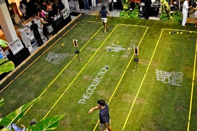 Barton G. setup three grassy boccie ball courts on the lower-level courtyard of the shops.