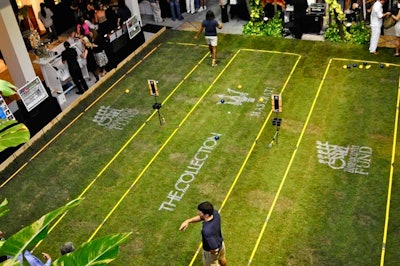 Barton G. setup three grassy boccie ball courts on the lower-level courtyard of the shops.