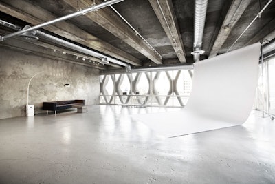 The space has a raw, industrial look, and is used for events as well as photo shoots.