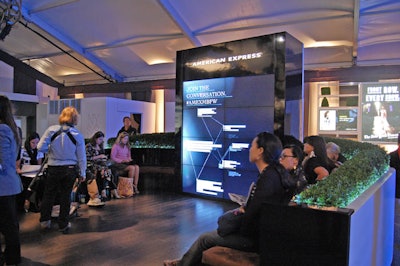 Expanding on the Twitter panel built for its front-of-house lounge in February, American Express exhibited tweets, messages, and images from a select group of bloggers, fashion experts, and designers on a multimedia wall that dominated its lobby booth.