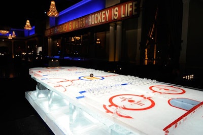 IceCulture used 9,000 pounds of ice to produce a 16-foot long hockey rink ice table dubbed the TIFF Shooter Bar, where guests could sample shots of Skyy Vodka.