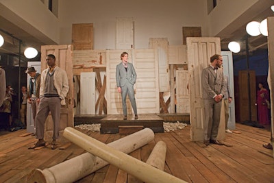 On Thursday evening at Milk Studios, Billy Reid's presentation took on a Southern inflection (the designer is from Louisiana) with a set influenced by Clarence John Laughlin's architectural photographs of the South during the 1920s, '30s, and '40s. Southern Accents Architectural Antiques provided distressed doors for the backdrop, which was built in Florence, Alabama.