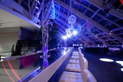 In the glass atrium, Event Creative hung large spheres encrusted with crystals and changing LED lights.
