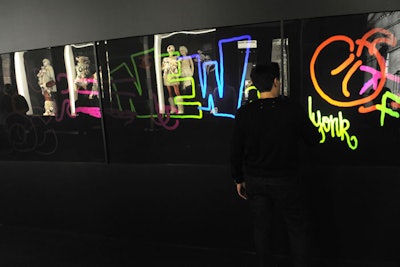 Professional graffiti artists worked with guests and created a more polished-looking piece at the end of the night.