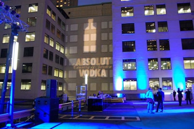 Event producer Jared Florence of VisionCo. worked with Phase 3 Productions to project images like the Absolut Vodka logo and bottle onto the exterior of the surrounding buildings.