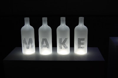 Each bottle in the 'I wouldn't make this up' installation had an individual letter etched into the glass.