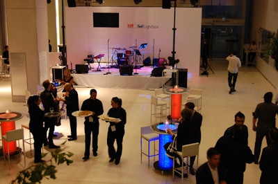 Furnishings by Corey supplied the rentals for the event, including cocktail tables lit up in orange and blue—the colours of the TIFF and Bell Canada logos.