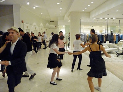 On Saks Fifth Avenue's fourth floor, customers could receive dance lessons with designers, including Elie Tahari, Mark Badgley, James Misschka, and Kay Unger.