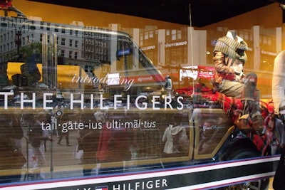 In addition to models and props in the adjacent pedestrian plaza, Macy's created tailgate scenes inside its windows to match the spring/summer campaign for Tommy Hilfiger.