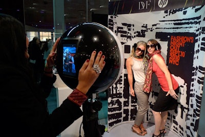These girls at the Diane von Furstenberg photo booth are a perfect example of the overly 'styled' folks who populated the meatpacking district at Fashion's Night Out. Was it Coco Chanel who reminded everyone to take one thing off after looking in the mirror?