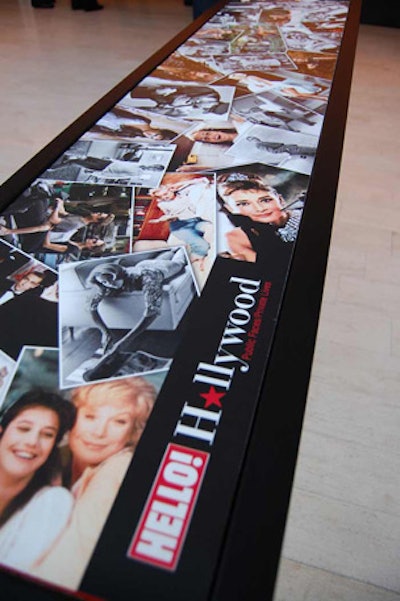 A collage of images of Hollywood stars like Audrey Hepburn, Julia Roberts, and Shirley MacLaine topped cocktail tables throughout the Royal Conservatory for Hello! Canada's TIFF party.