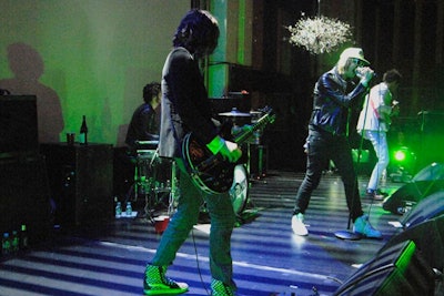 For the Tommy Hilfiger shindig, the Strokes performed eight songs on a custom-built stage open to the Opera House's atrium. A backdrop was erected to allow for video projections designed by Paul Clay.