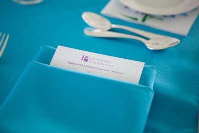 Some tables bore Tiffany-blue linens, a nod to the event's home at the Tiffany & Company Foundation Celebration Garden.
