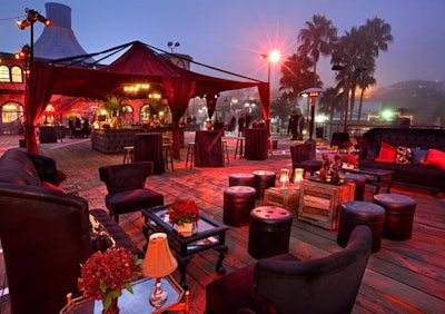 Furniture in dark tones and tableside lamps evoked a speakeasy feel at HBO's Boardwalk Empire premiere.