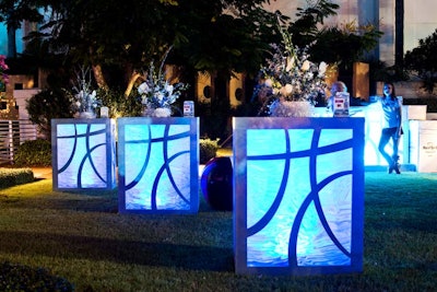 Cubical high-tops illuminated from within symbolized blocks of ice.