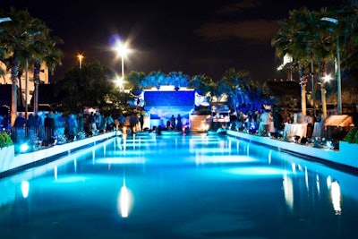 Showorks Inc. illuminated the pool with blue lights and created an ice wall with cascading water at one end.