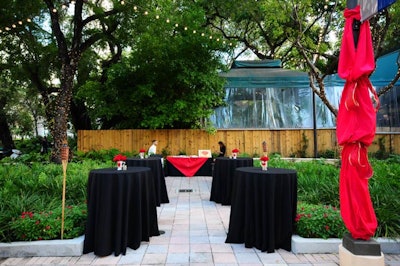 RazzleDazzle owner Elena Linares used all red and black linens and drape to decorate the courtyard.