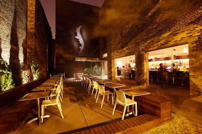 Off the main dining room, a garden patio seats 34 and can be booked for alfresco events.