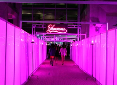 Guests entered the after-party through a pink-lit walkway with an illuminated pink sign bearing the event's name.