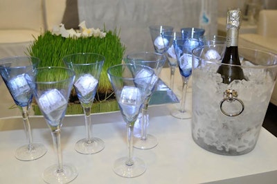 Lounge tables were stocked with bottles of prosecco and champagne glasses filled with lit-up cubes.