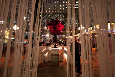 Although the doors to the Sea Grill and Rock Center Café were left open for the New York party, Invision Events demarcated each area with a white fringe curtain.