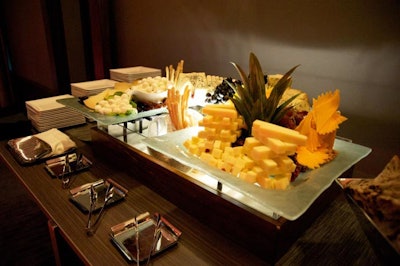 The cocktail buffet included a variety of cheeses, as well as traditional Peking duck with steamed pancakes, pork buns, and both vegetable and pork dumplings.