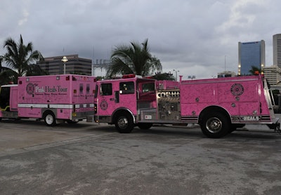 The tour's pink fire trucks are covered in names of cancer victims and survivors written by event attendees from around the country.