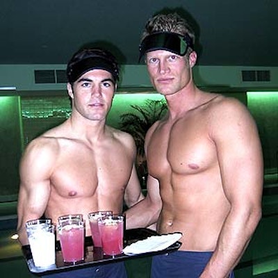At the opening party for the new Equinox Fitness Club in the West Village, caterwaiters dressed in swimsuits and visors served drinks in the basement pool area.