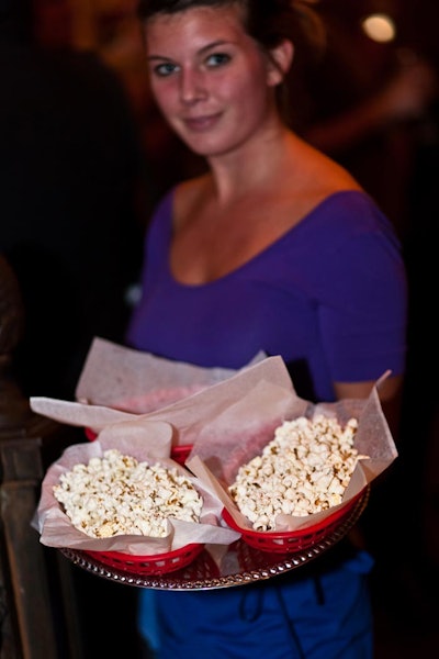 Snacks, including popcorn baskets, accompanied cocktails form the Beehive's cash bar.