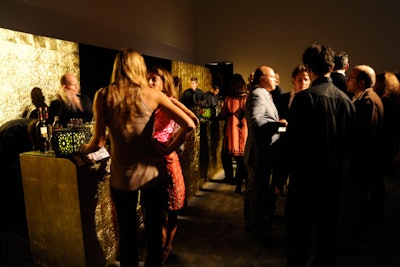 To make the two bars look as though they were made from real gold, the design team covered them with metallic sheets. From these posts, bartenders served a specialty drink called the Casbah Rouge martini, a mix of rum, ginger beer, grapefruit juice, and cloves.