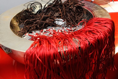 To welcome guests, a traditional khmissa or Fatima hand was specially designed and given out at the event. Women received a necklace, and men a bracelet, after checking in.