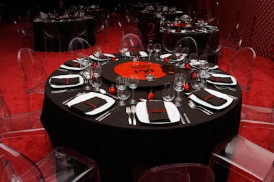 A total of 30 tables accommodated 288 guests for dinner. Marrakech's signature red was infused into the decor, from the obvious red carpet to the more subtle napkin rings, made from thin strips of suede.