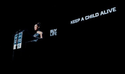 Pregnant Alicia Keys performed alongside Sade, who hadn't made a concert appearance in six years. An important element to the evening was introducing the new 'Buy Life' campaign to guests and explaining the importance of using the bar codes to make donations.
