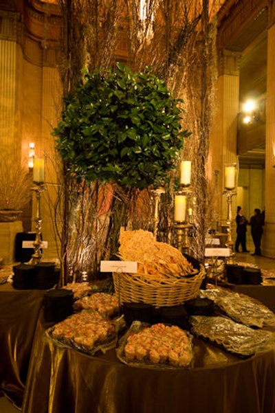 In the lobby, buffet tables were adorned with branches and leafy arrangements from Heffernan Morgan.