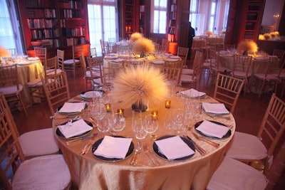 More than 200 attendees dined at the White-Meyer House, where David Stark topped gold-accented tables with centerpieces made from dried wheat.