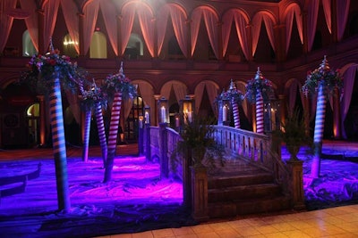 Attendees entered the National Building Museum via an arched wooden bridge constructed by Shakespeare Theatre Company set designers.