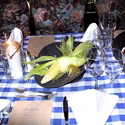 Country-style table decorations included ears of corn.