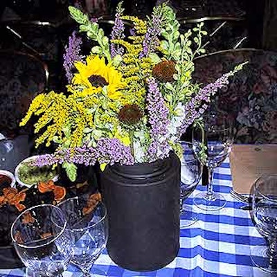 Susan Edgar's flower arrangements used appropriately un-fussy wildflowers, including daisies and sunflowers.