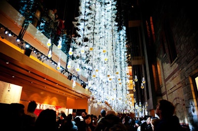 Philip Beesley hung layers of cables with microprocessor-driven lights in the atrium at the Royal Conservatory of Music for an installation called 'Aurora.'