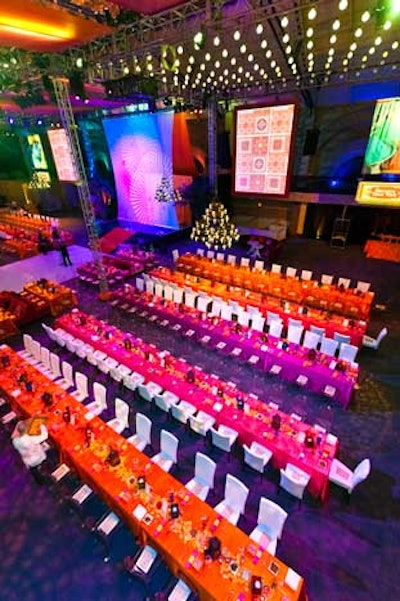 Rows of communal dining tables flanked the stage and dance floor.