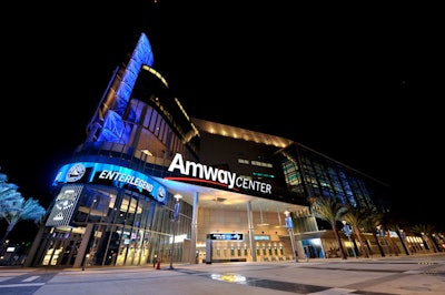 The Amway Center exterior is a mix of glass and metal, with a 180-foot tower that houses an outdoor bar.