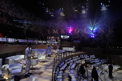 Inside the Allen Room, the event's main area, BML projected 'imagine' and layered patterns on the wall to add texture. DeJuan Stroud provided the design of the furniture setup, using modern white lounge furniture in the upper tiers and simple white chairs in the lower section.