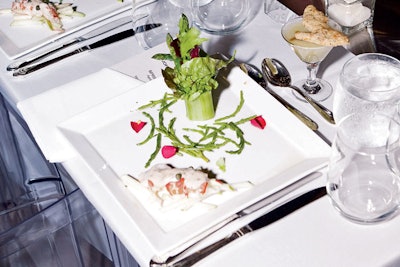 Jewell Events Catering prepared lobster remoulade with a cucumber collar, asparagus, pomegranate seeds, and an edible red rose for a dinner for Chicago's Joffrey Ballet.