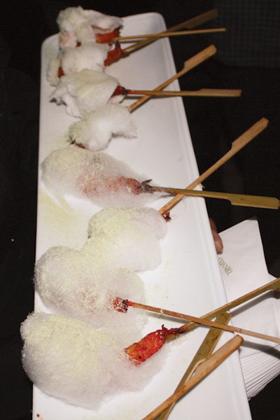 Daniel et Daniel served grilled tiger shrimp on sugar cane skewers spun with wasabi cotton candy at Power Ball 12 in Toronto.