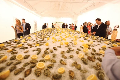 Hundreds of oysters were laid out on ice for wedding guests to shuck themselves.