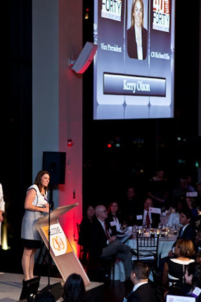 As each recipient went up to the stage, a large screen showed his or her photo and company information, along with the 40 Under 40 logo.