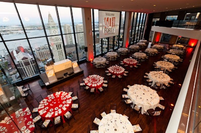 Decor was minimal, letting the State Room's floor-to-ceiling views of downtown Boston set the backdrop for a red-and-white color scheme and BBJ branding.