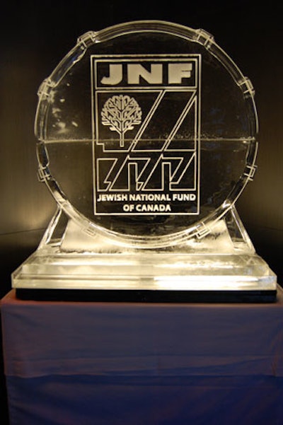 GoldenChefs created an ice sculpture in the shape of a drum and bearing the JNF logo.