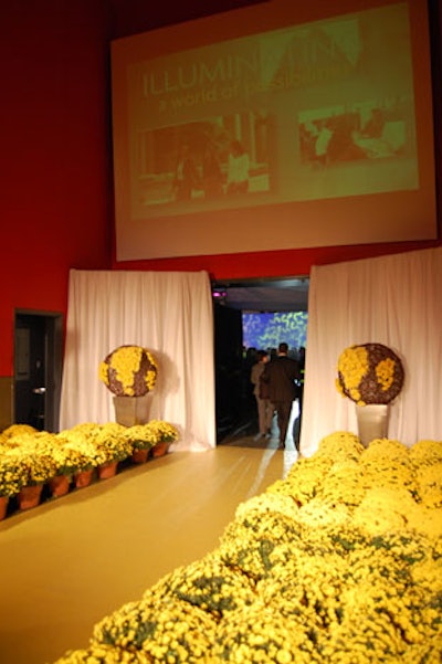 Rows of potted yellow mums flanked either side of a yellow carpet at the entrance to Sun Life's Toronto launch event at the Kool Haus.